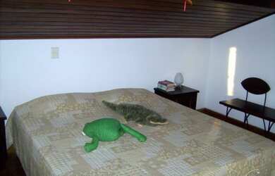 Imagem 8: Casa em Guarujá. Churrasqueira, Varanda, Área de serviçoeLareira