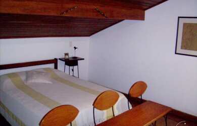 Imagem 5: Casa em Guarujá. Churrasqueira, Varanda, Área de serviçoeLareira