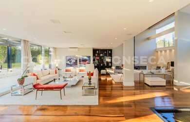 Imagem: A casa em condomínio possui 4 Dormitórios, 5 Banheiros, 3