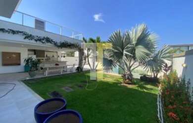 Imagem: A casa em condomínio possui 5 Dormitórios, 5 Banheiros, 3