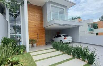 Imagem: A casa possui 4 Dormitórios, 4 Banheiros, 2 Vagas na garagem