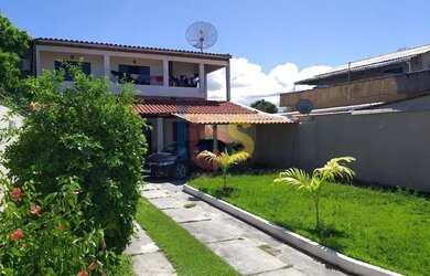 Imagem: A casa possui 3 Dormitórios, 3 Banheiros, 4 Vagas na garagem