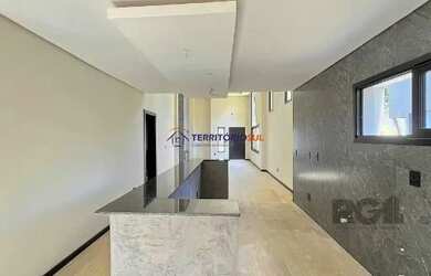 Imagem 12: Casa em Porto Alegre, no bairro Hípica, com 3 dormitório s , e 3 banheiros,...