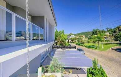 Imagem: A casa em condomínio possui 4 Dormitórios, 5 Banheiros, 2