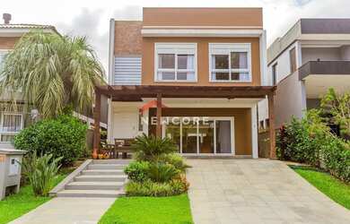 Imagem: A casa em condomínio à venda possui 4 Dormitórios, 4 Banheiros