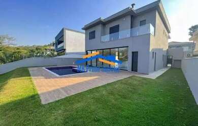 Imagem: A casa em condomínio possui 4 Dormitórios, 5 Banheiros, 5