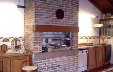 Imagem 9: Casa em Guarujá. Churrasqueira, Varanda, Área de serviçoeLareira