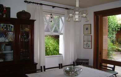 Imagem 14: Casa em Guarujá. Churrasqueira, Varanda, Área de serviçoeLareira