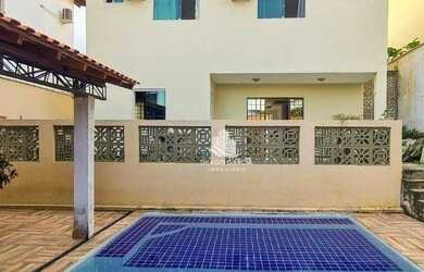 Imagem: A casa possui 4 Dormitórios, 5 Banheiros, 4 Vagas na garagem