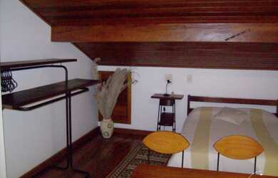 Imagem 6: Casa em Guarujá. Churrasqueira, Varanda, Área de serviçoeLareira