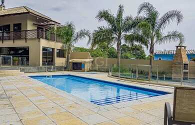 Imagem: A casa em condomínio possui 4 Dormitórios, 4 Banheiros, 2