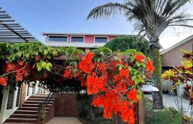 Imagem: A casa em condomínio possui 4 Dormitórios, 5 Banheiros, 4
