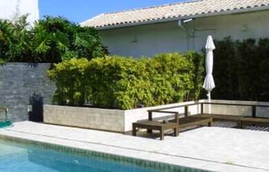 Imagem: A casa para alugar possui 5 Dormitórios, 4 Banheiros, 4 Vagas