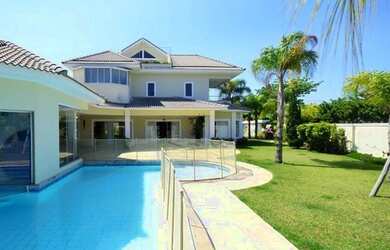 Imagem: A casa em condomínio possui 5 Dormitórios, 5 Banheiros, 5