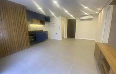 Imagem: O apartamento possui 1 Dormitório, 2 Banheiros, 1 Vaga na garagem