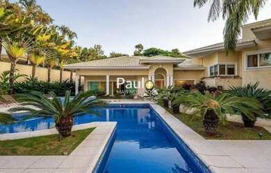 Imagem: A casa em condomínio possui 5 Dormitórios, 5 Banheiros, 5