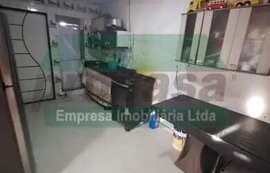 Imagem: A casa possui 5 Dormitórios, 1 Banheiro, 1 Vaga na garagem