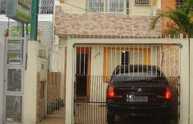 Imagem: A casa possui 2 Dormitórios, 1 Banheiro, 1 Vaga na garagem