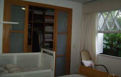 Imagem 15: Casa em Guarujá. Churrasqueira, Varanda, Área de serviçoeLareira