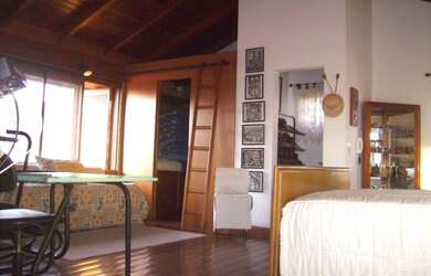 Imagem 12: Casa em Guarujá. Churrasqueira, Varanda, Área de serviçoeLareira