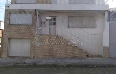 Imagem: A casa possui 3 Dormitórios, 2 Banheiros, 1 Vaga na garagem