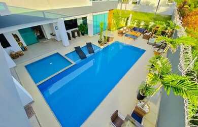 Imagem: A casa em condomínio possui 5 Dormitórios, 5 Banheiros, 5