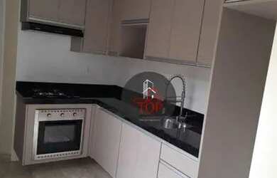 Imagem: O apartamento possui 2 Dormitórios, 1 Banheiro, 1 Vaga na garagem