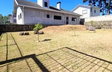 Imagem: A casa possui 3 Dormitórios, 1 Banheiro, 3 Vagas na garagem