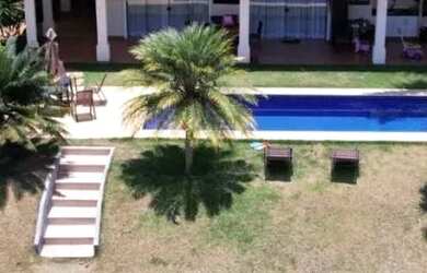 Imagem: A casa em condomínio possui 4 Dormitórios, 5 Banheiros, 2