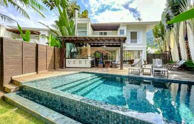 Imagem: A casa em condomínio à venda possui 4 Dormitórios, 4 Banheiros