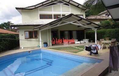 Imagem: A casa em condomínio possui 5 Dormitórios, 5 Banheiros, 1