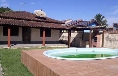 Imagem: A casa possui 3 Dormitórios, 1 Banheiro, 3 Vagas na garagem