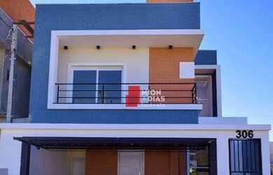 Imagem: A casa possui 3 Dormitórios, 1 Banheiro, 2 Vagas na garagem