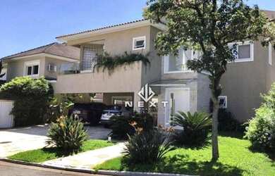 Imagem: A casa em condomínio possui 4 Dormitórios, 5 Banheiros, 4