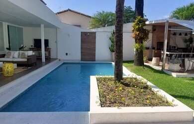 Imagem: A casa em condomínio possui 5 Dormitórios, 5 Banheiros, 3