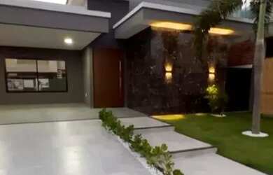 Imagem: A casa possui 4 Dormitórios, 5 Banheiros, 4 Vagas na garagem