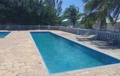 Imagem: A casa em condomínio possui 3 Dormitórios, 3 Banheiros, 5