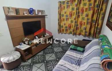 Imagem: A casa possui 5 Dormitórios, 2 Banheiros, 2 Vagas na garagem