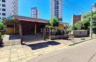 Imagem: A casa possui 3 Dormitórios, 4 Banheiros, 4 Vagas na garagem