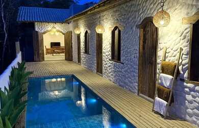 Imagem: A casa em condomínio possui 4 Dormitórios, 5 Banheiros, 3