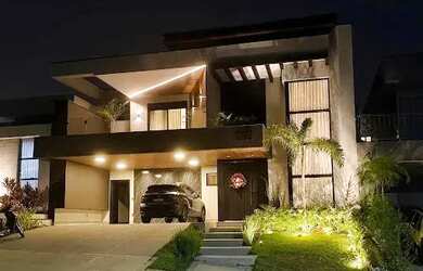 Imagem: A casa em condomínio possui 4 Dormitórios, 5 Banheiros, 4