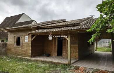 Imagem: A casa possui 3 Dormitórios, 2 Banheiros, 3 Vagas na garagem