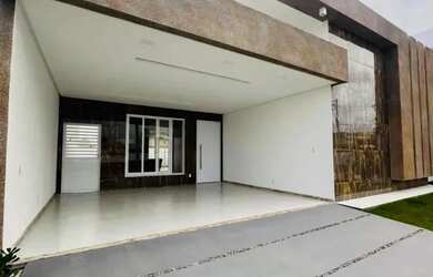 Imagem: A casa possui 3 Dormitórios, 4 Banheiros, 3 Vagas na garagem