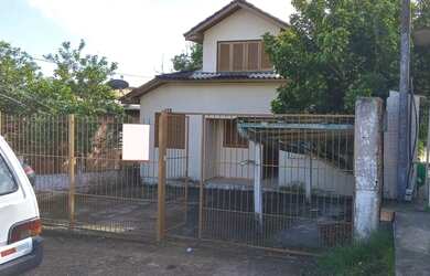 Imagem 2: Terreno com 3 casas. 100m² de Área, 1 Vaga na garageme3 Dormitórios