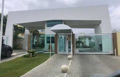 Imagem: A casa em condomínio possui 4 Dormitórios, 5 Banheiros, 600m²