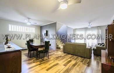 Imagem: A casa possui 3 Dormitórios, 4 Banheiros, 5 Vagas na garagem