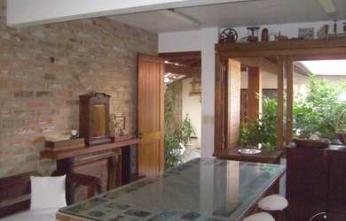 Imagem 11: Casa em Guarujá. Churrasqueira, Varanda, Área de serviçoeLareira