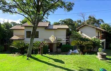 Imagem: A casa em condomínio possui 5 Dormitórios, 5 Banheiros, 5