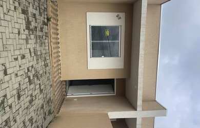 Imagem: A casa possui 2 Dormitórios, 1 Banheiro, 2 Vagas na garagem