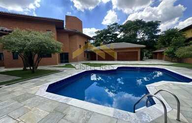 Imagem: A casa possui 4 Dormitórios, 4 Banheiros, 4 Vagas na garagem